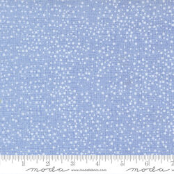 Dotty Thatched in Cloudy Sky